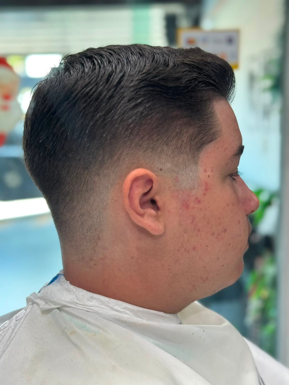 Corte masculino realizado na Barbearia do Ton